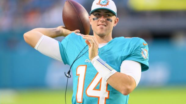 Miami Dolphins quarterback Mike White (14) throws the ball during an NFL pre-season football game against the Washington Commanders, Saturday, Aug. 17, 2024.