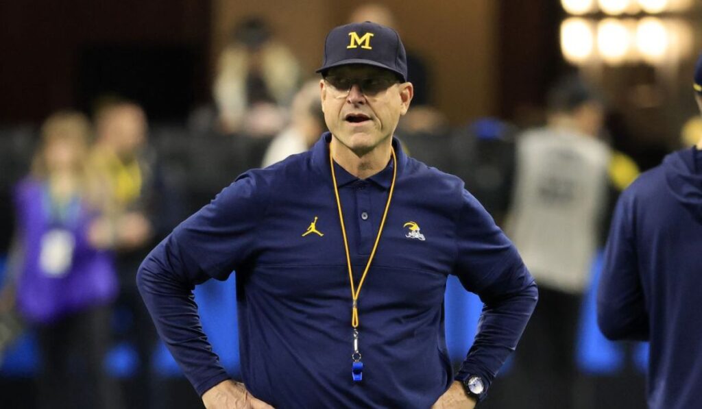 Los Angeles Chargers coach Jim Harbaugh, shown here in May during OTAs, led Michigan