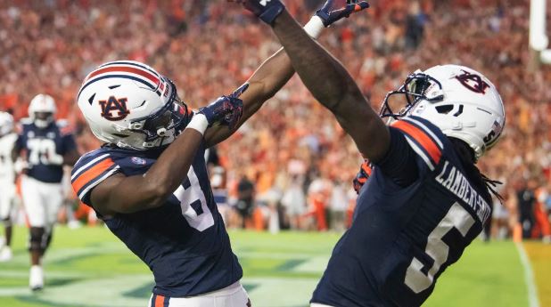 Auburn Tigers wide receivers Cam Coleman and KeAndre Lambert-Smith celebrate in a win over Alabama A&M. / Jake Crandall/