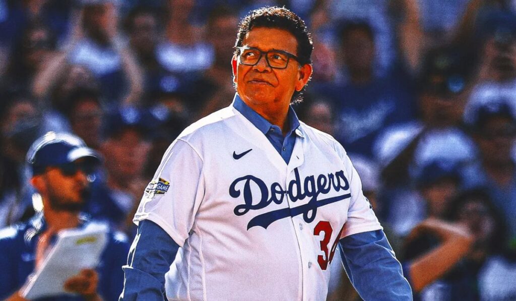 Historic photo of Valenzuela's iconic windup] Alt text: "Fernando Valenzuela demonstrating his famous skyward-looking pitching delivery for the Los Angeles Dodgers"