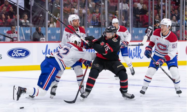 A headline reading 'NHL Injury News: Canadiens Face Setback', highlighting the Montreal Canadiens' challenges following Kirby Dach's long-term injury.