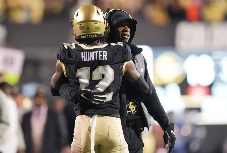 Deion Sanders discusses Travis Hunter's injury status after Colorado's game against Kansas State, highlighting concerns for the upcoming matchup against Arizona.