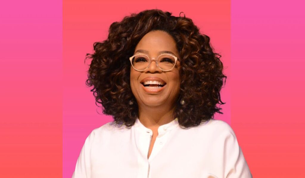 Oprah Winfrey passionately addressing a crowd, urging voters to take action before the upcoming Kamala Harris rally, with a sense of urgency and determination in her expression.