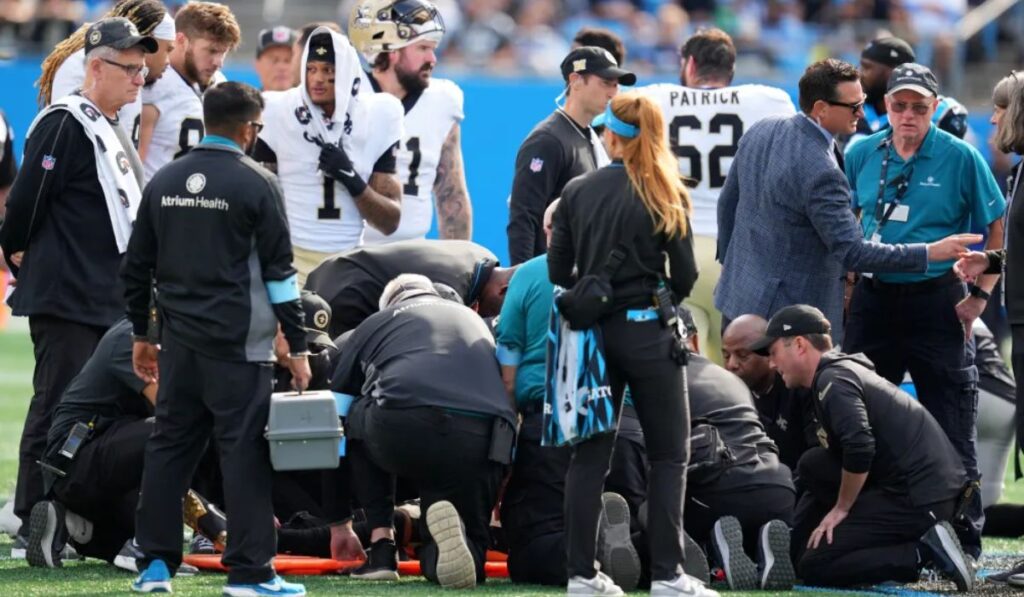 New Orleans Saints wide receiver on the field during a game, showcasing the intensity of NFL matchups.